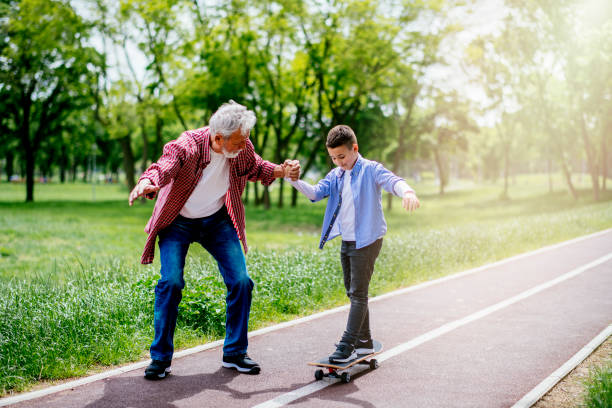 istock Little boy trying skateboard 1151162332