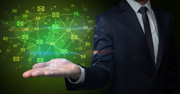 istock Businessman holding communication symbols 1151163308