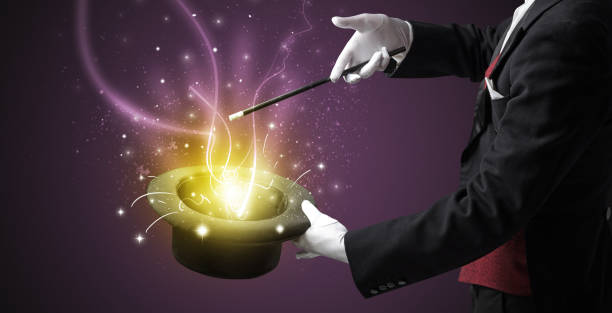 istock Magician hand conjure miracle from cylinder 1151163565