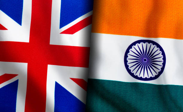 istock British and Indian flags standing side by side 1151164619