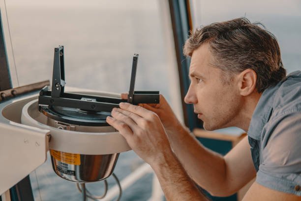 istock deck officer taking magnetic compass error onboard of vessel 1151169855