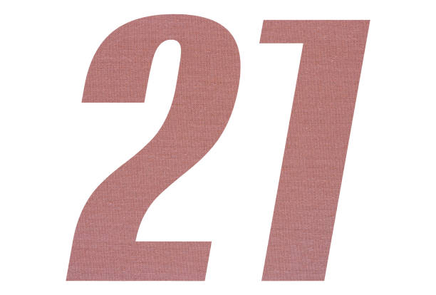 istock Number 21 with terracotta colored fabric texture on white background 1151170464
