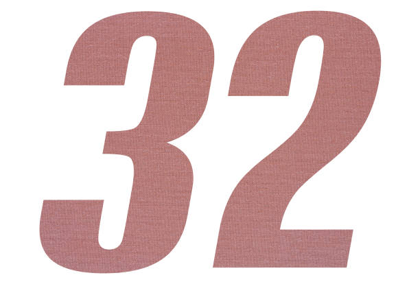 istock Number 32 with terracotta colored fabric texture on white background 1151171972