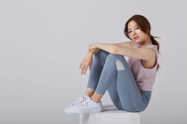 istock Asian girl sit with confident on block 1151172373