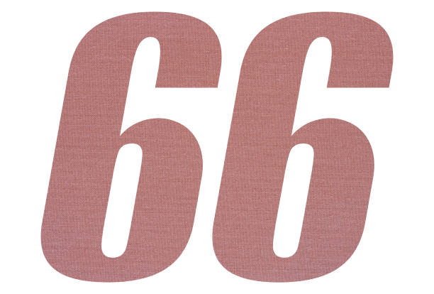istock Number 66 with terracotta colored fabric texture on white background 1151173609