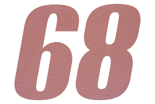 istock Number 68 with terracotta colored fabric texture on white background 1151173701