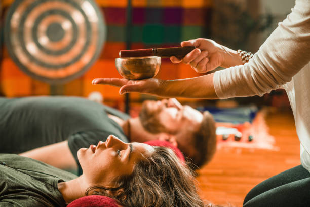 Tibetan singing bowl Tibetan singing bowl in sound therapy tibet culture stock pictures, royalty-free photos & images