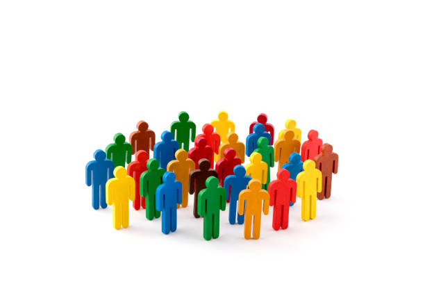 istock Colorful painted group of people figures on white background 1151176052