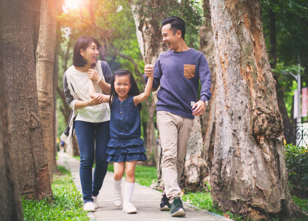istock Asian family having a walk outdoors in summer, Taipei 1151178521