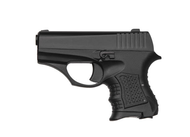 istock A small black modern pistol for concealed carrying isolate on a white background. 1151182403