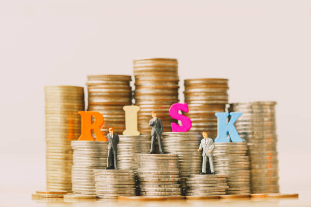 istock Risk management and small businessmans on bank passbook. 1151186223