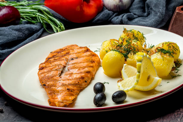 istock Salmon steak on the grill 1151186949