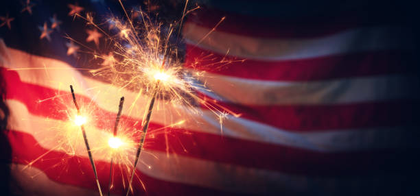 istock Sparklers And American Flag - Independence Day 1151187365
