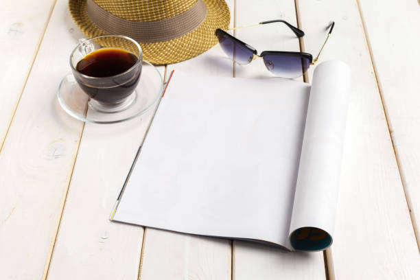 istock Mock-up magazine or catalog on a wooden table. 1151187508