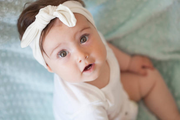 Vrijgekomen rijkdom Premisse Portrait Of 8 Month Old Baby With Bandanas Stock Photo - Download Image Now  - Baby - Human Age, Bandana, Cute - iStock