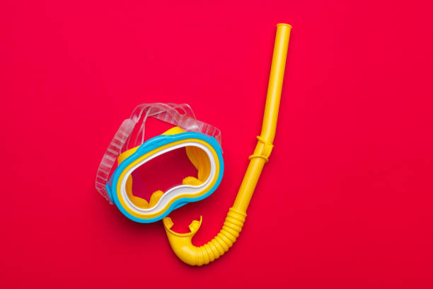 Snorkeling mask equipment on a vibrant background
