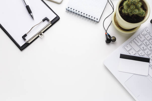 istock Business Items dropped in creative Disorder on white Table 1151189975