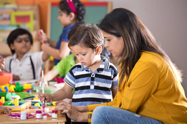 istock Children with teacher in art class 1151191601