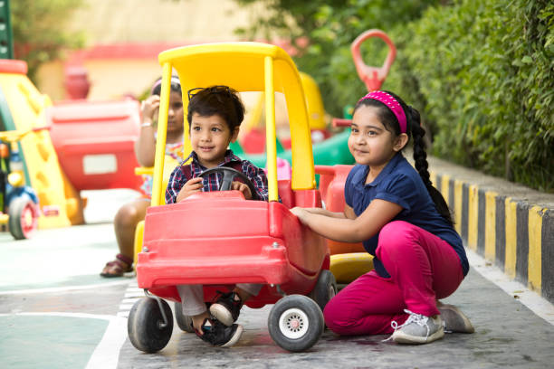 istock Children playing on toy rides 1151191685