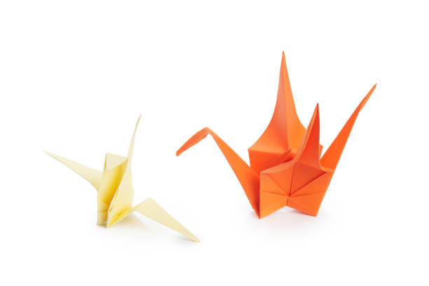 istock origami crane on white background 1151191761