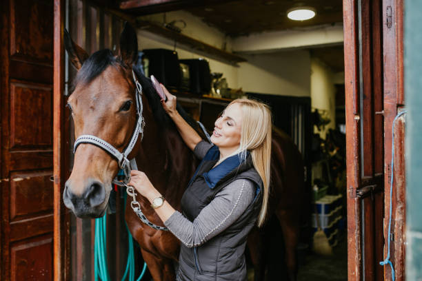 istock Woman with horse 1151195146