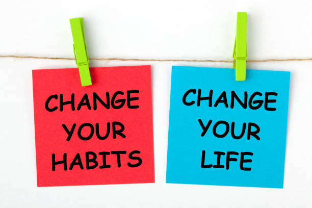 Change Habits Change Life Change Your Life by Changing Your Habits text written on color notes with wooden pinch. dependency photos stock pictures, royalty-free photos & images