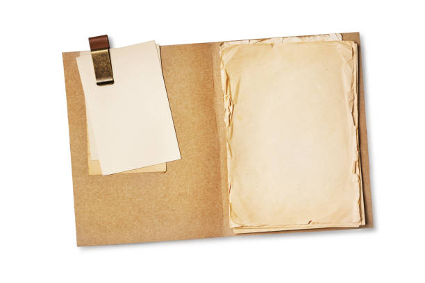 istock Folder with yellowed paper sheets and mock up for vintage cards 1151197608