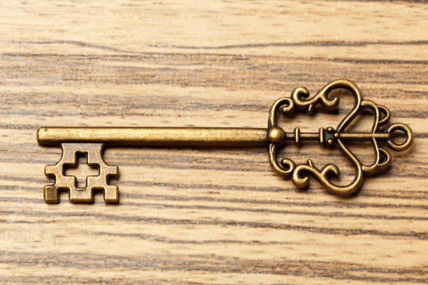 istock old key on wooden table 1151198041