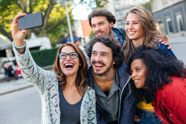 istock International friends taking selfie 1151198408