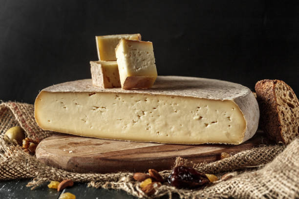 istock Cheese on the wooden table 1151198479