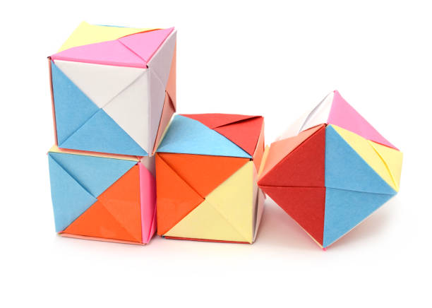 istock Folding origami cubes, colorful paper 1151200002