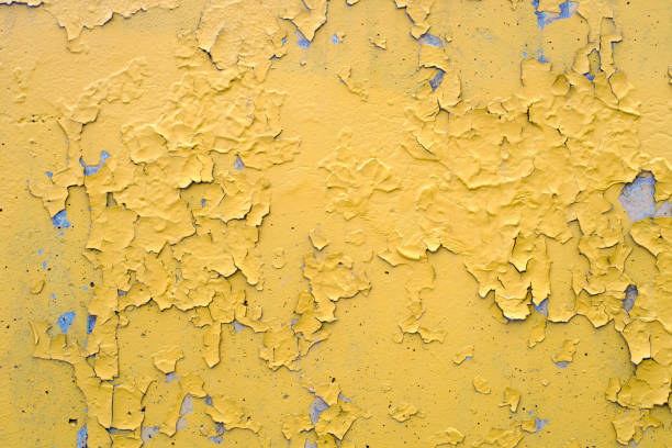istock yellow paint concrete rough cracked scaled texture 1151200251