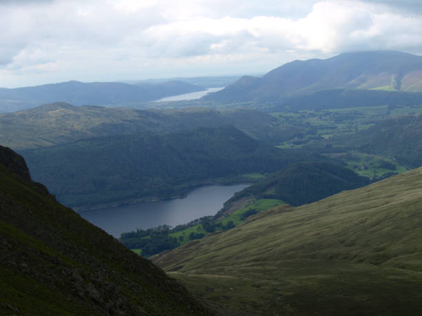 istock Lake District UK with Valley and low cloud / fog 1151201459