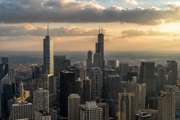 Photo of Top view of Chicago cityscape river side at the sunset time, USA downtown skyline, Architecture and building with tourist concept