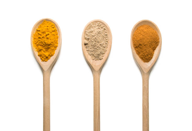 istock Photos Wooden Spoon filled with various spices 1151201753