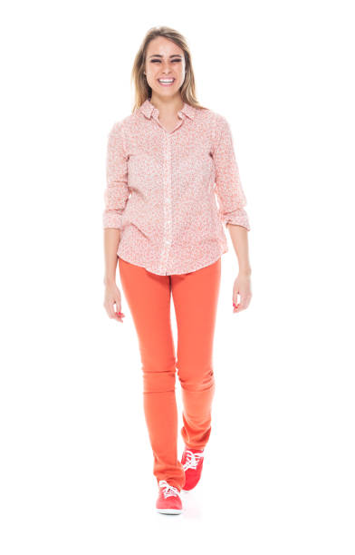 istock Beautiful white female in bright clothes - walking 1151201755