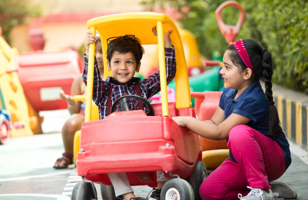 istock Children playing on toy rides 1151202478