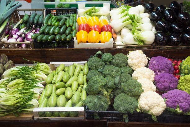 istock Fresh vegetables on shelf in greengrocer's shop 1151204105