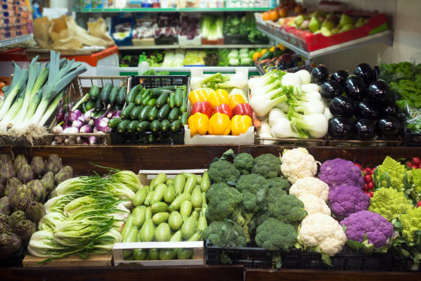 istock Fresh vegetables on shelf in greengrocer's shop 1151204113