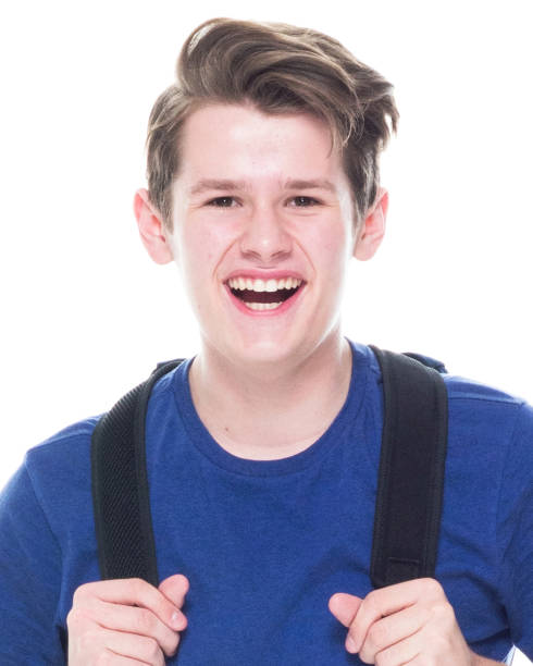 istock Young high school age male student wearing a backpack 1151204124