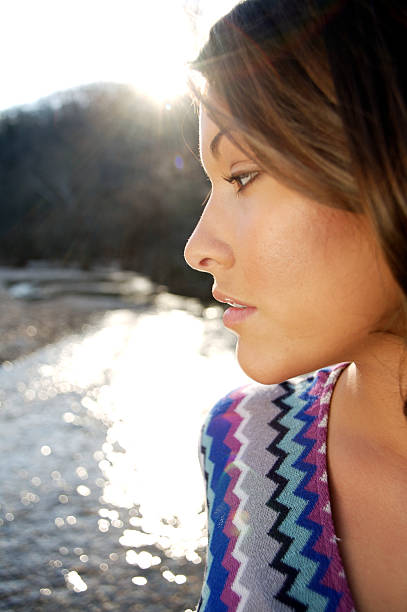 istock young woman winter sunset portraits 115120689