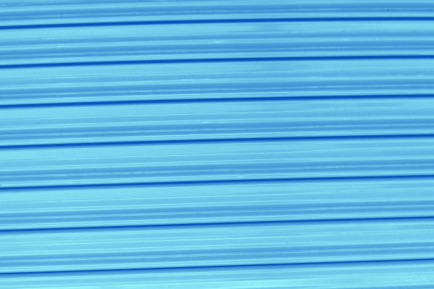 istock Zinc plate blue background close up 1151210347