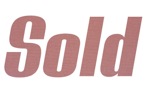 istock Sold word with terracotta colored fabric texture on white background 1151210506