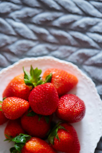 strawberry on a plate stock photo
