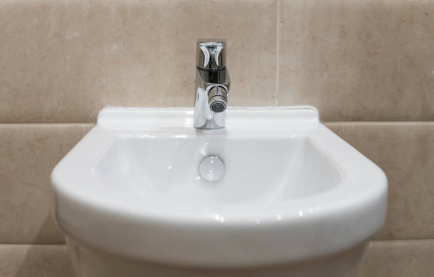 istock White ceramic bidet in modern bathroom. wc. 1151212147