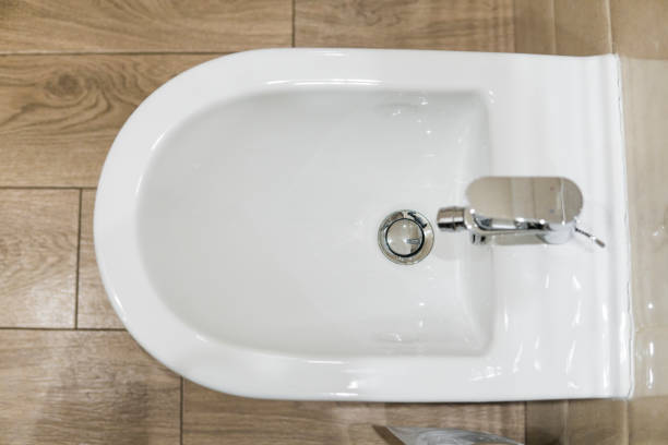 istock White ceramic bidet in modern bathroom. wc. 1151214927
