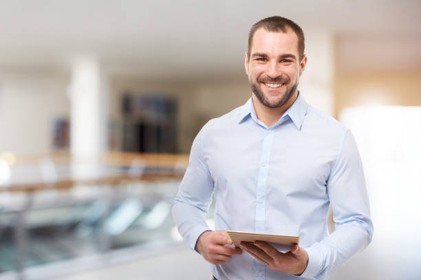 istock Business man in the business center with tablet computer 1151215355