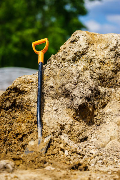 istock Digging with a shovel. A shovel based on a pile of earth. 1151215519