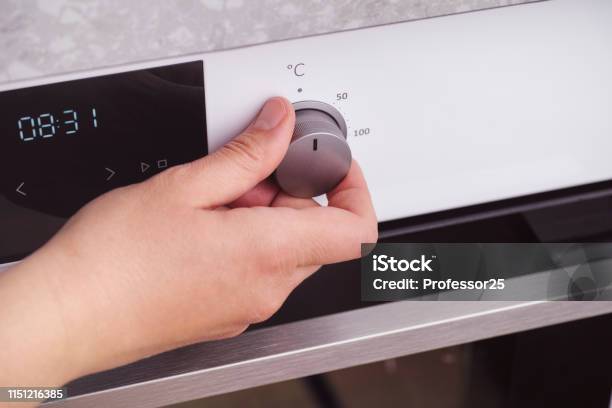 https://media.istockphoto.com/id/1151216385/photo/person-setting-the-temperature-in-celsius-on-the-oven.jpg?s=612x612&w=is&k=20&c=rSD4nHvW9k4G-d5oscnSz6t1563b_ICJ-ohtlMzob44=