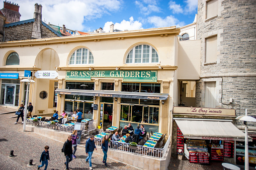 Biarritz, France - May 04, 2019: Tourists exploring Biarritz city center, France